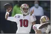  ?? SCOTT EKLUND — THE ASSOCIATED PRESS, FILE ?? San Francisco 49ers quarterbac­k Jimmy Garoppolo passes against the Seahawks during the first half on Nov. 1, 2020, in Seattle.