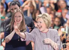  ??  ?? Left: Hillary at the DNC in 1992 with the Texas delegation. Right, the Clintons greet supporters in Manhattan on April 19.