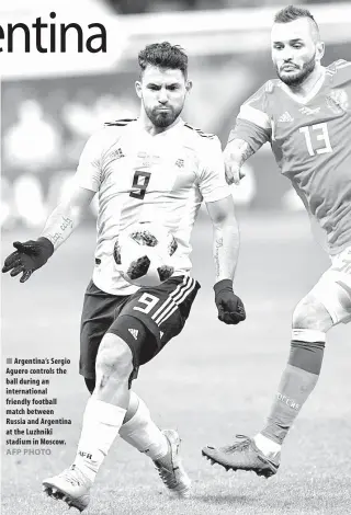  ??  ?? Argentina’s Sergio Aguero controls the ball during an internatio­nal friendly football match between Russia and Argentina at the Luzhniki stadium in Moscow.