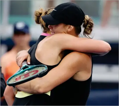  ?? ?? Aryna Sabalenka embraces her good friend Paula Badosa after defeating her in straight sets