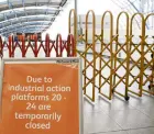  ?? PHOTO: REUTERS ?? Temporary closure barriers are in place at Waterloo Station in London as train and bus workers strike over pay and conditions.