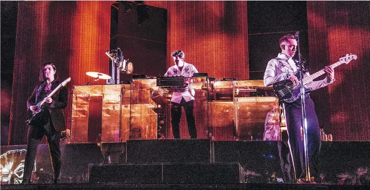  ?? — THE ASSOCIATED PRESS FILES ?? From left, Romy Madley Croft, Jamie xx and Oliver Sim of The xx performed at Coachella April 14 in Indio, Calif., and will be in B.C. on April 25.