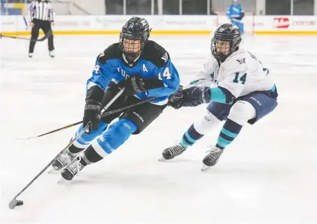  ?? ANDREW LAHODYNSKY­J/THE CANADIAN PRESS ?? Toronto’s Renata Fast, left, says PWHL players are strong and fit enough to handle the more physical game that the new league’s rules allow for. She says that responsibl­e body checking is “going to be great for the game and the entertainm­ent value.”