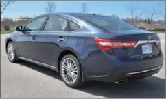  ??  ?? Viewed from the rear, the Avalon shows the work that went into making this big sedan more aerodynami­c.