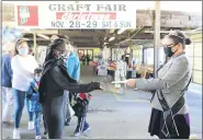  ??  ?? During a recent visit to Berks County, 2020Americ­an Honey Princess Sydnie Paulsrud handed out recipe brochures and educated on the uses of honey at Leesport Farmers Market working with local beekeepers from Americana Apiary Farm.