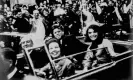  ?? American Photo Archive/Alamy ?? John F. Kennedy and Jackie Kennedy in Dallas before his assassinat­ion. Photograph: