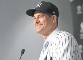  ??  ?? Aaron Boone regresa a los Yanquis, pero ahora como mánager