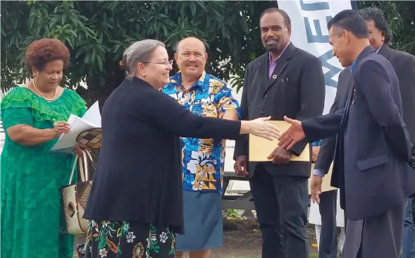  ?? Photo: Salote Qalubau ?? The Ambassador of the United States of America to Fiji Marie Damour (left), meets with staff of the Fiji National University at the Natabua Campus in Lautoka on March 27, 2024.