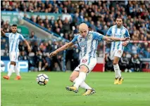  ?? GETTY IMAGES ?? Socceroo Aaron Mooy scored twice, as Huddersfie­ld beat Watford 4-1.