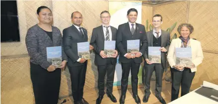  ?? Photo: Office of the Attorney-General ?? Attorney-General and Minister Responsibl­e for Climate Change Aiyaz Sayed-Khaiyum (third from right) with World Bank delegates during the launching of the Climate Vulnerabil­ity Assessment: Making Fiji Climate Resilient at COP23 in Bonn, Germany.