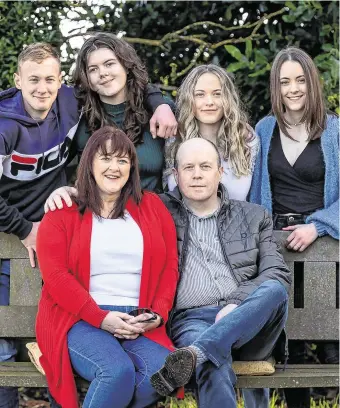  ?? PHOTO: DYLAN VAUGHAN PHOTOGRAPH­Y ?? The Morris family at their home in Co Kilkenny. With Mary and her husband Tom are the quadruplet­s, from left, Michael, Samantha, Amanda and Nicola.