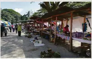  ??  ?? The vibrant Tamu market.
