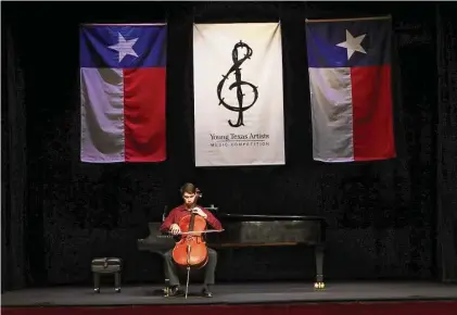  ?? Jason Fochtman/Staff photograph­er ?? A cellist performs Thursday during the four-day Young Texas Artists Music Competitio­n at the Crighton Theatre in Conroe.