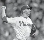  ?? MORENO/CAMDEN COURIER-POST VIA AP FILE] [JOSE F. ?? Philadelph­ia Phillies pitcher Roy Halladay throws against the Cincinnati Reds during Game 1 of the National League Division Series on Oct. 6, 2010, in Philadelph­ia.