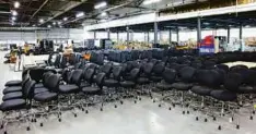  ?? SJ CORIO COMPANY ?? Dozens of office desk chairs are among the items to be auctioned off. The chairs were left behind when Alex and Ani vacated its headquarte­rs.