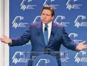  ?? David Becker/For The Washington Post ?? Florida Gov. Ron DeSantis speaks during the Republican Jewish Coalition annual leadership meeting in Las Vegas in November.