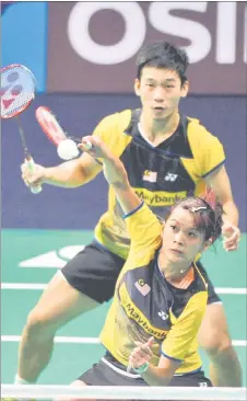  ??  ?? Peng Soon and Liu Ying compete in a mixed doubles match during the BWF Superserie­s Finals in 2013. — Bernama file photo