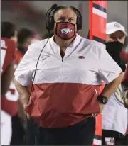  ?? (NWA Democrat-Gazette/Charlie Kaijo) ?? Sam Pittman became the first coach to lead Arkansas to a bowl game in his first season since Houston Nutt in 1998. The only others to do it were Ken Hatfield in 1984, Lou Holtz in 1977 and John Barnhill in 1946.