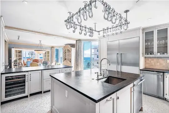  ?? DOUGLAS ELLIMAN REAL ESTATE / COURTESY PHOTOS ?? The largest penthouse in Hillsboro Beach is a full-floor, 7,780-square-foot unit with five bedrooms, seven baths, a den, office, home theater, billiards lounge, fitness room and 360-degree views.