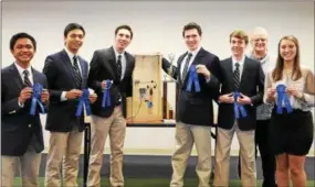  ?? SUBMITTED PHOTO ?? The winning team from Bishop Shanahan High School poses with their coach after the Chester County Governor’s PA STEM Competitio­n award ceremony on Tuesday.