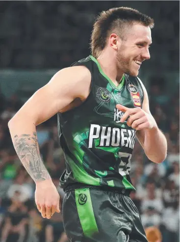  ?? Picture: AAP IMAGE ?? Mitch Creek of the Phoenix celebrates scoring during the Round 13 NBL match against the Illawarra Hawks. Phoenix will need to improve their defensive game to be a title threat.
