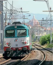  ?? KEITH FENDER ?? With the famous Duomo cathedral dome visible in the background, D445 No. 1068, pushes its train from Siena towards Firenze Santa Maria Novella at Firenze Rifredi on August 1, 2017.