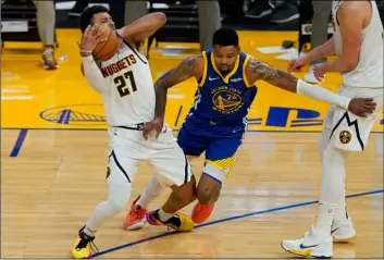  ?? AP Photo/Jeff Chiu ?? Denver Nuggets guard Jamal Murray (27) is fouled by Golden State Warriors forward Kent Bazemore (26) during the first half of an NBA basketball game in San Francisco, on Monday.