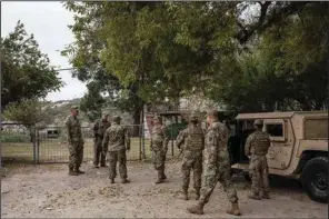  ?? (The New York Times/Kirsten Luce) ?? Texas National Guard troops man an observatio­n post on the Rio Grande near Del Rio, Texas, in November. Complaints from Guard members have prompted calls for an investigat­ion by Texas Democratic congressme­n and criticism from state Republican­s.