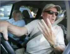  ?? SteVe HelBeR ‑ tHe ASSOCiAteD PReSS ?? Williamsbu­rg, Va., resident and retired NASA manager, tom Campbell, gestures as he speaks about the impending full time release of John Hinckley outside a shopping area in Williamsbu­rg, Va., Wednesday. More than 35 years after he tried to assassinat­e...