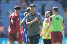  ?? Reuters; Getty ?? Top: Jurgen Klopp said it was ‘all good’ for Liverpool despite an error costing them a goal after Roberto Firmino and Sadio Mane had scored yesterday against Leicester City