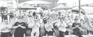  ?? ?? TERUJA: Tiang (tengah) bersama kenamaan lain semasa menghadiri Pogram Kempen Keselamata­n Jalan Raya Peringkat Bahagian Sibu Sempena Sambutan Tahun Baharu Cina 2024 di Sibu.