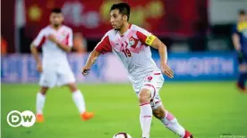  ??  ?? Tajikistan captain Akhtam Nazarov during a game against China
