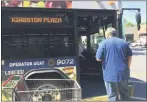  ?? BRIAN HUBERT
— DAILY FREEMAN FILE ?? A passenger asks a
UCAT bus driver for route informatio­n on July 1 outside the Hannaford supermarke­t at Kingston Plaza during the first day that UCAT buses operate on former Citibus routes.