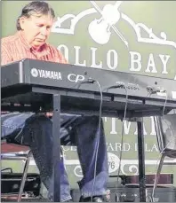  ?? SUBMITTED PHOTO ?? Kevin Chaisson ‘tickles the ivories’ at the recent Rollo Bay Fiddle Festival.