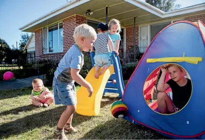  ?? PHOTOS: JOSEPH JOHNSON/FAIRFAX NZ ?? Children play in the front yard at the Culverden Plunket site.