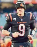  ?? Emilee Chinn / Associated Press ?? Cincinnati Bengals quarterbac­k Joe Burrow acknowledg­ed Baltimore is pretty good at taking away their favorite plays.