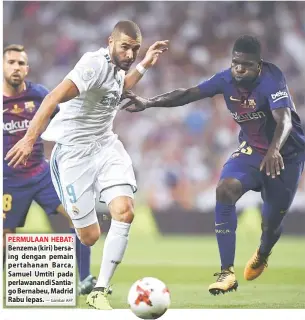  ?? — Gambar AFP ?? PERMULAAN HEBAT: Benzema (kiri) bersaing dengan pemain pertahanan Barca, Samuel Umtiti pada perlawanan di Santiago Bernabeu, Madrid Rabu lepas.