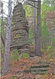  ?? CHELSEY LEWIS / MILWAUKEE JOURNAL SENTINEL ?? Castle Mound in the Black River State Forest is home to castellate­d bluffs and rock formations like this one.