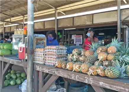  ?? Photo: Laisa Lui ?? Labasa market vendors mask up while at their table on July 8,2021.