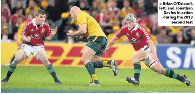  ??  ?? > Brian O’Driscoll, left, and Jonathan Davies in action during the 2013 second Test