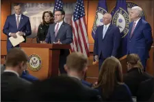  ?? MARIAM ZUHAIB — THE ASSOCIATED PRESS ?? Speaker of the House Mike Johnson, R-La., speaks during a news conference on Capitol Hill Wednesday, April 10, 2024, in Washington. Pictured from left are Rep. Blake Moore, R-Utah, Rep. Maria Salazar, R-Fla., Majority Leader Steve Scalise, R-La. and House Majority Whip Tom Emmer, R-Minn.