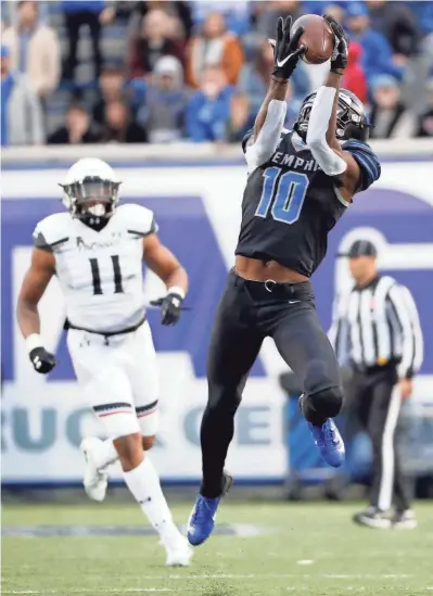  ?? MAX GERSH / THE COMMERCIAL APPEAL ?? Memphis' Damonte Coxie (10) brings in a pass Friday, Nov. 29, 2019, during a game against Cincinnati at Liberty Bowl Memorial Stadium in Memphis.