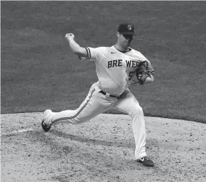  ?? GETTY IMAGES ?? Justin Topa gave up a homer but struck out two batters and threw 98 mph in his debut.