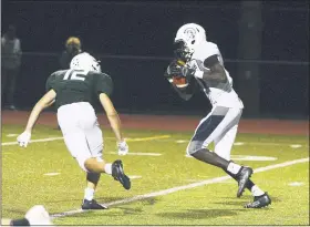  ?? OWEN MCCUE - MEDIANEWS GROUP FILE ?? Pottstown football player Jahzeel Watson, right, said he and other Pottstown seniors were heart broken about not having a fall season.