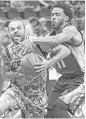 ?? Tom Reel / San Antonio Express-News ?? The Spurs’ Tony Parker, left, fights his way past the Grizzlies’ Mike Conley to the basket during Thursday’s game.