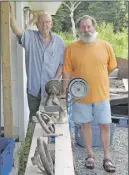  ??  ?? From left, Art Keeble and Mel Simon stand beside the lathe.