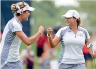  ?? Reuters ?? US golfers Cristie Kerr and Lexi Thompson on the 10th green during the second day of The Solheim Cup. —