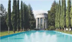  ?? Provided by San Francisco Public Utilities Commission ?? Cypress trees flank a reflecting pool at Pulgas Water Temple in Redwood City, Calif., the terminus of the Hetch Hetchy Aqueduct.