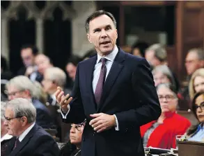  ?? SEAN KILPATRICK / THE CANADIAN PRESS ?? Finance Minister’s Bill Morneau’s tax tinkering is not enough, Andrew Coyne writes.