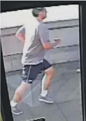  ??  ?? CCTV image of the jogger crossing the bridge